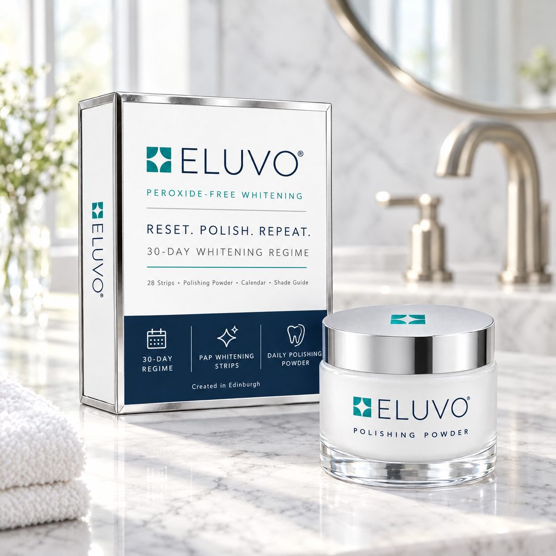The ELUVO box and polishing-powder jar on a white marble bathroom counter in soft daylight.